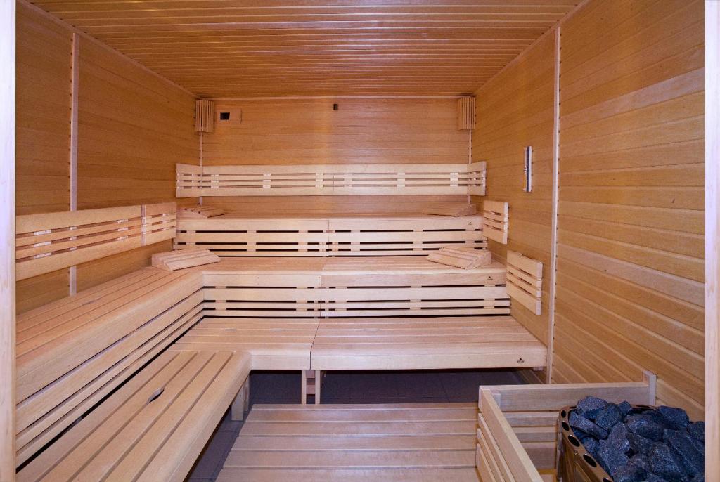 Palanda nebo palandy na pokoji v ubytování Hotel Vinice Hnanice