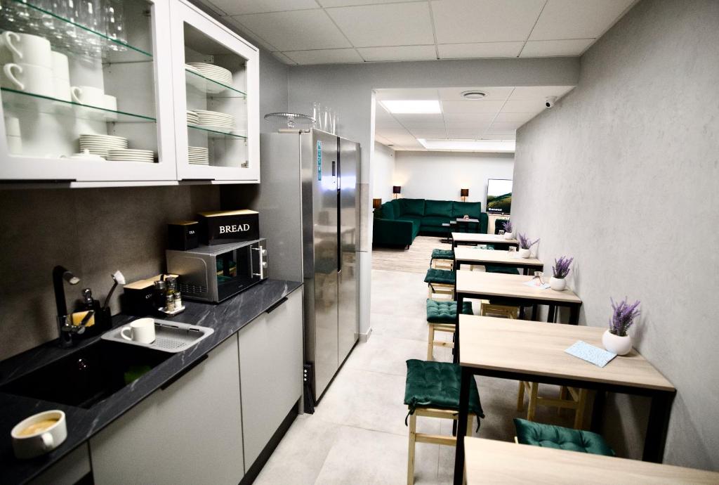 Kuchyň nebo kuchyňský kout v ubytování Hostel OPEN GARDEN