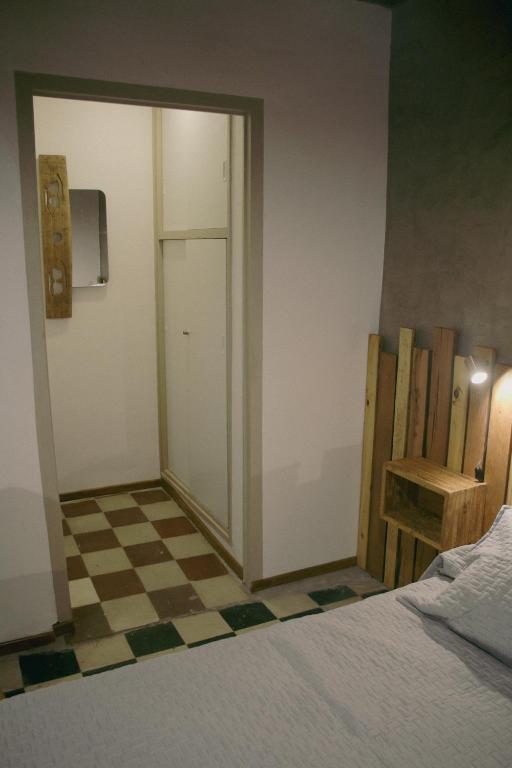 Postel nebo postele na pokoji v ubytování El Alero Hospedaje