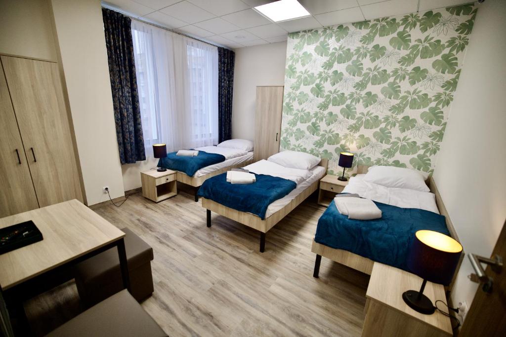 Postel nebo postele na pokoji v ubytování Hostel OPEN GARDEN