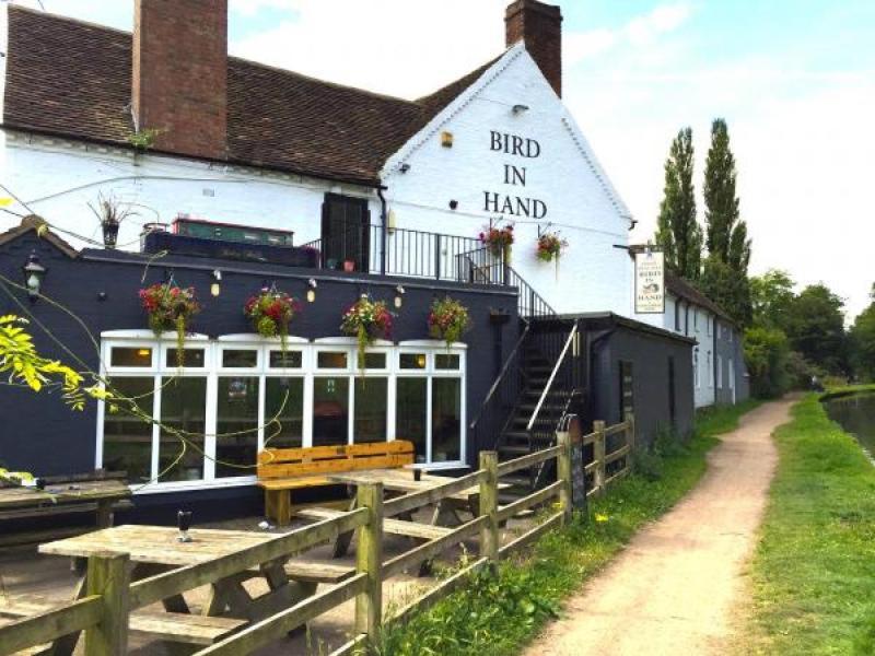 a building with a sign that reads bird in hand at The Bird in Hand in Stourport