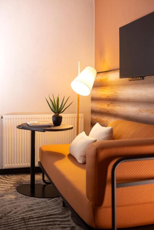 TV a/nebo společenská místnost v ubytování ibis Styles Les Houches Chamonix