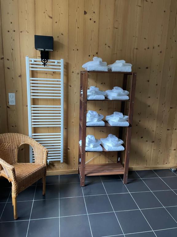 Televízia a/alebo spoločenská miestnosť v ubytovaní La maison des douceurs