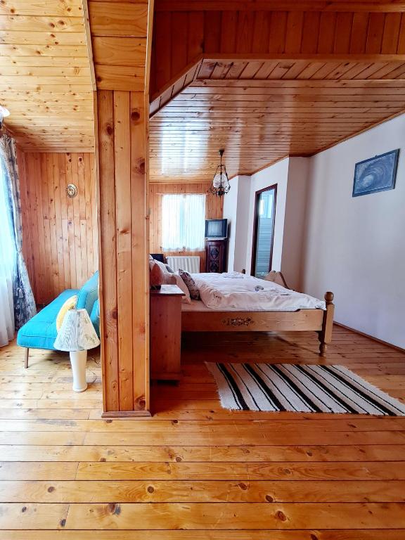 Postel nebo postele na pokoji v ubytování Casa RAI