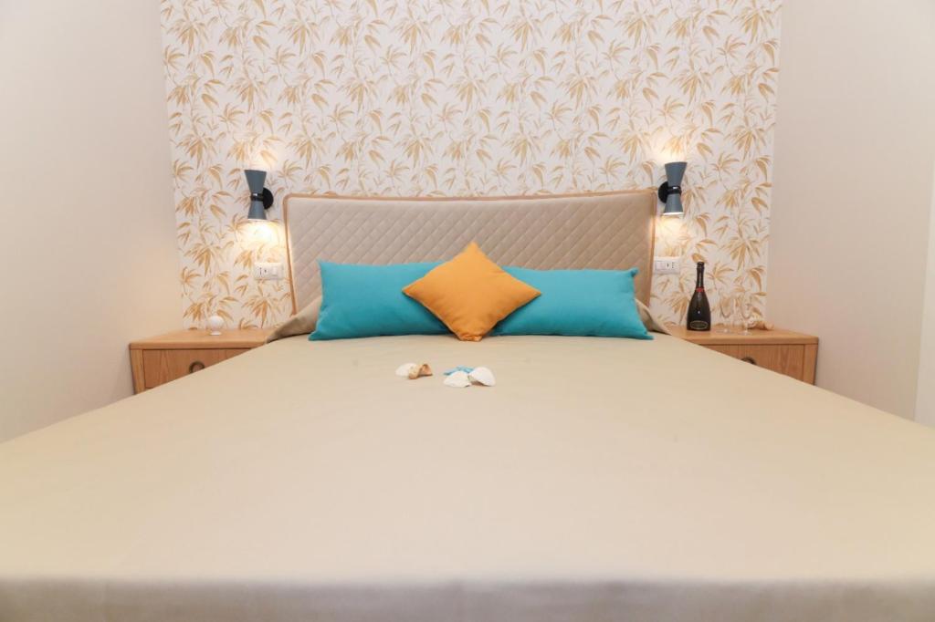 Postel nebo postele na pokoji v ubytování MaLù BEST Rooms - Tropea