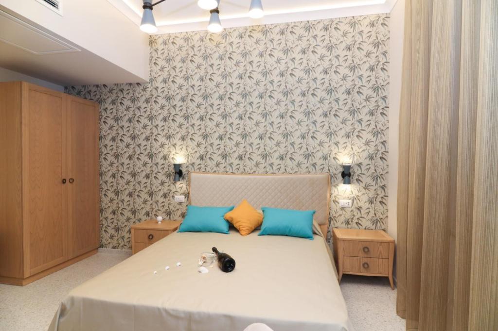 Postel nebo postele na pokoji v ubytování MaLù BEST Rooms - Tropea