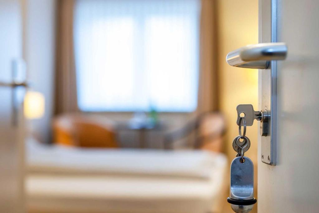 Postel nebo postele na pokoji v ubytování Landgasthof Struckum