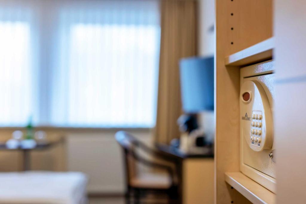 Postel nebo postele na pokoji v ubytování Landgasthof Struckum