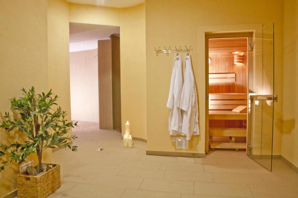 Postel nebo postele na pokoji v ubytování Erlebnishotel Fendels