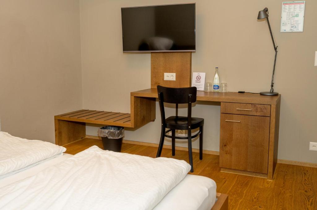 Postel nebo postele na pokoji v ubytování Hotel Bären