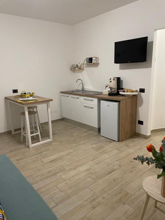 Kuchyň nebo kuchyňský kout v ubytování B&B Archimede