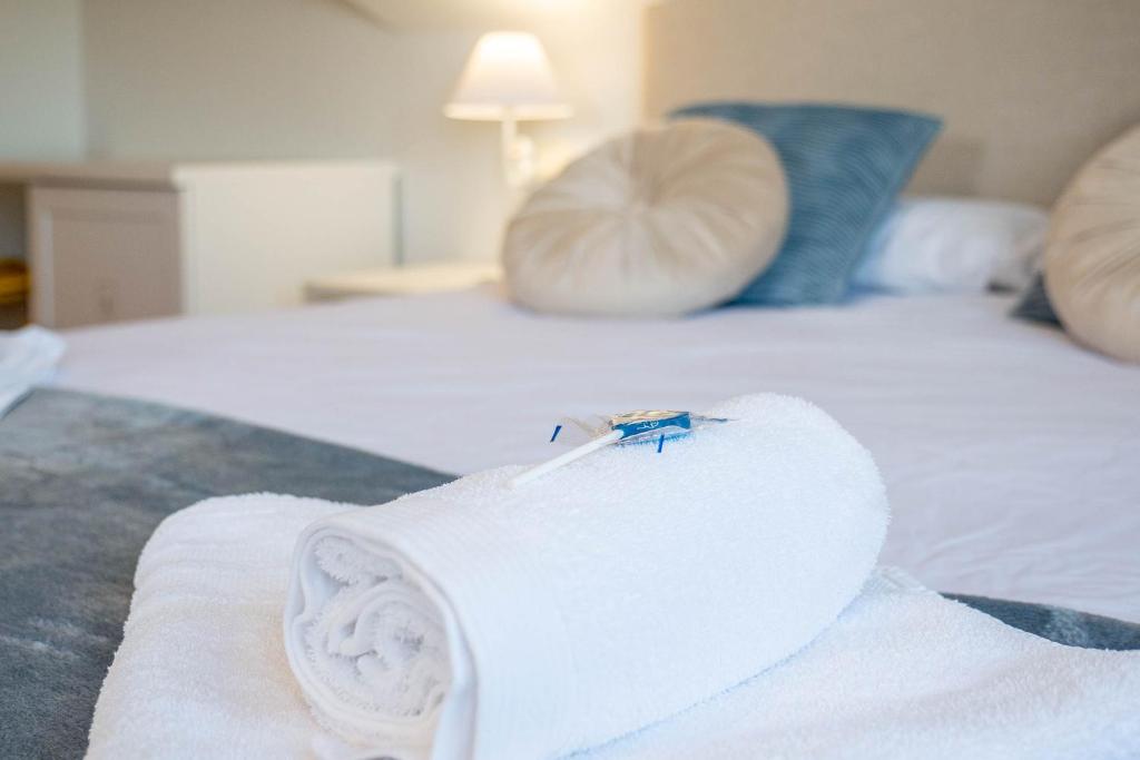 Postel nebo postele na pokoji v ubytování Bista Eder Hotel & Lodge