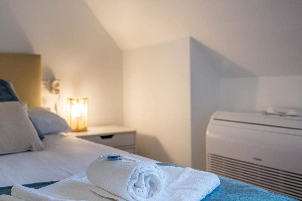 Postel nebo postele na pokoji v ubytování Bista Eder Hotel & Lodge