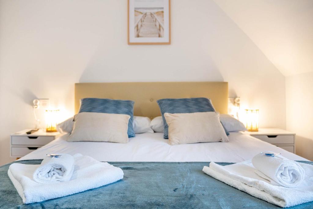 Postel nebo postele na pokoji v ubytování Bista Eder Hotel & Lodge