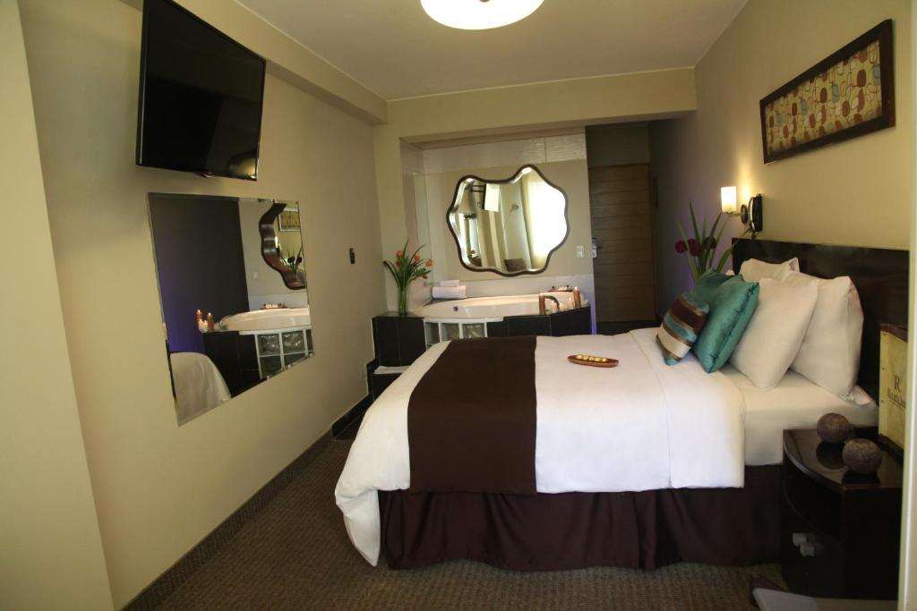 Postel nebo postele na pokoji v ubytování Hotel Rivera Inn