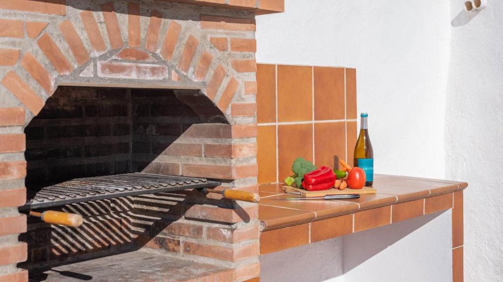 Kuchyň nebo kuchyňský kout v ubytování Casa Maite Sol Nerja by Ruralidays