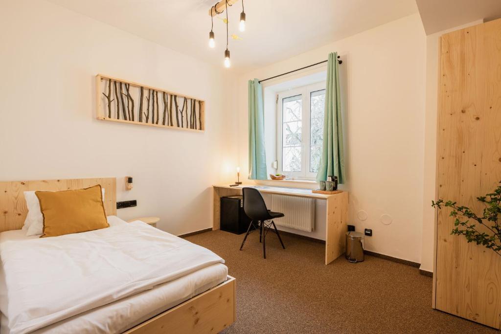 Postel nebo postele na pokoji v ubytování Hotel Rehavital