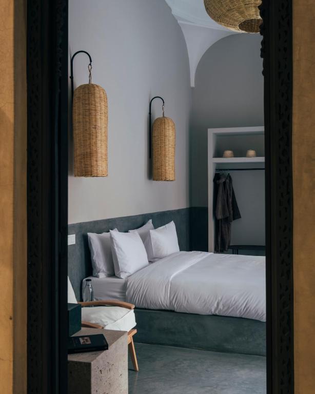 Uma cama ou camas num quarto em Riad no37