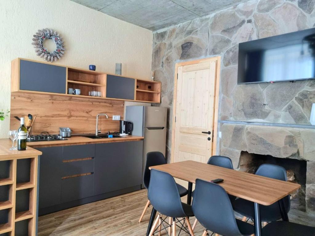 Kuchyň nebo kuchyňský kout v ubytování Greenfield Bakuriani