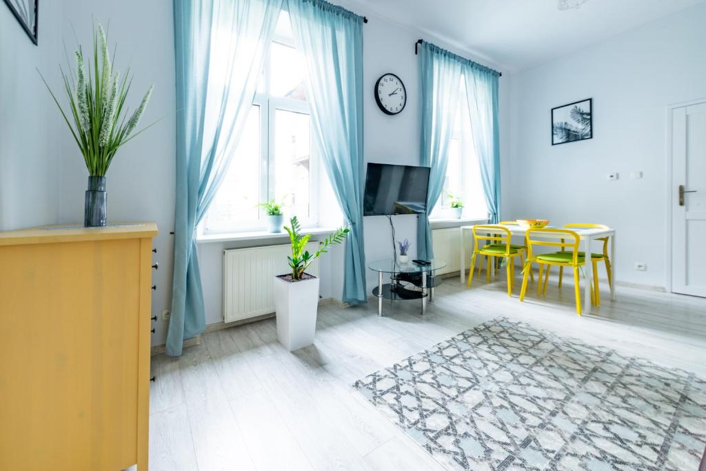 Televízia a/alebo spoločenská miestnosť v ubytovaní Wawel Castle Apartment