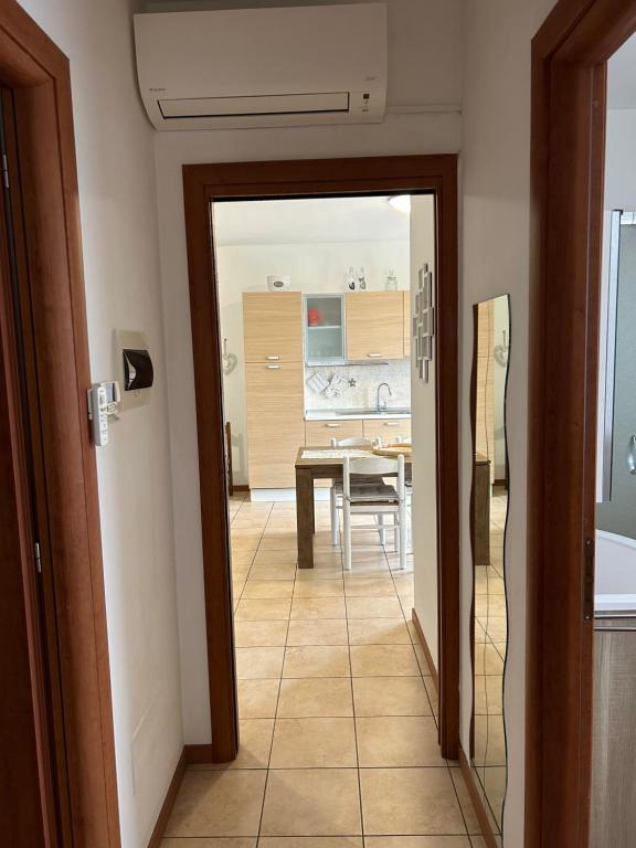 Kuchyň nebo kuchyňský kout v ubytování Green Room Del Garda