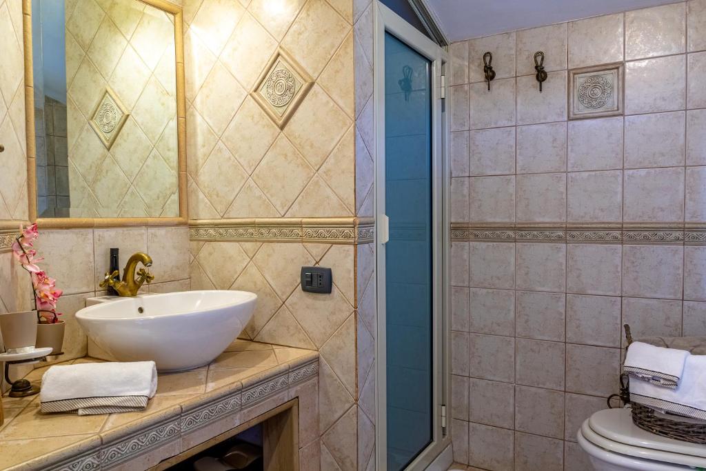 Koupelna v ubytování Villa TreA