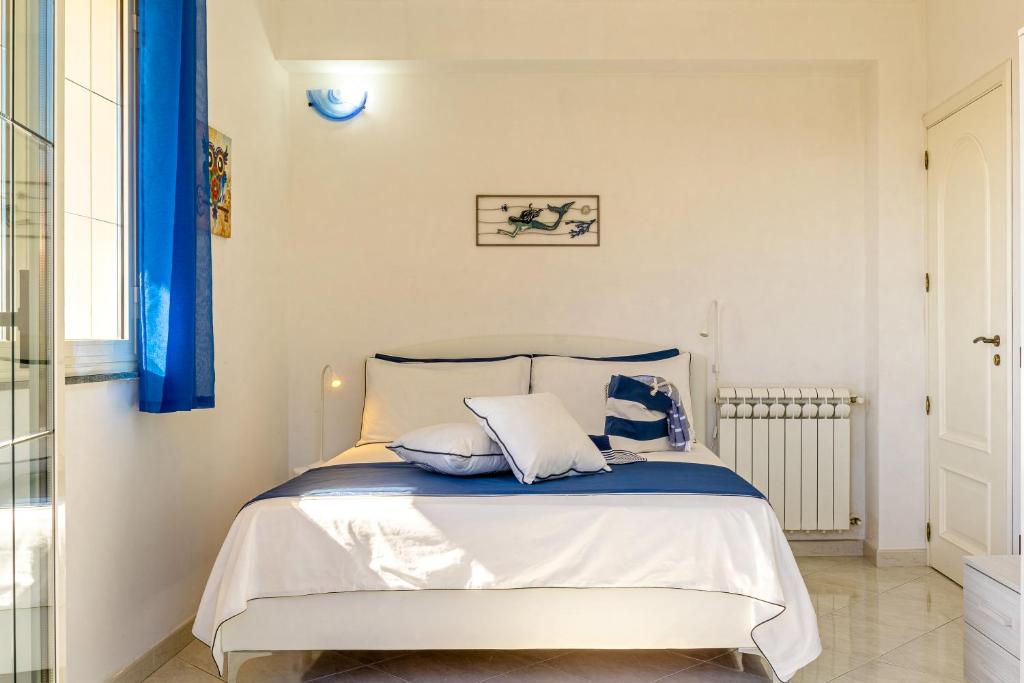 Postel nebo postele na pokoji v ubytování Villa TreA
