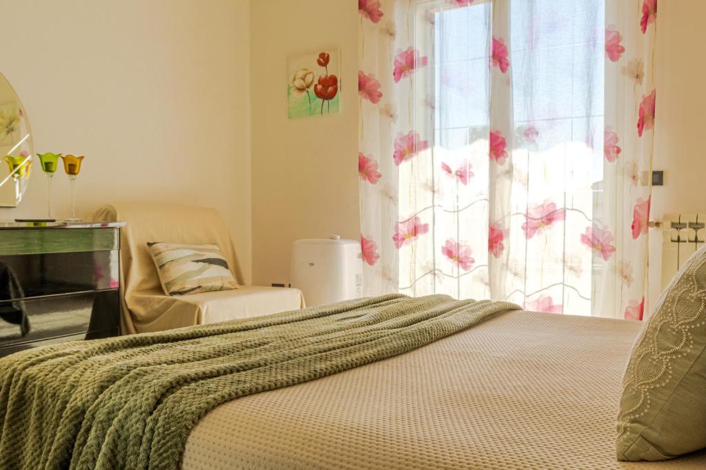 Postel nebo postele na pokoji v ubytování Villa TreA