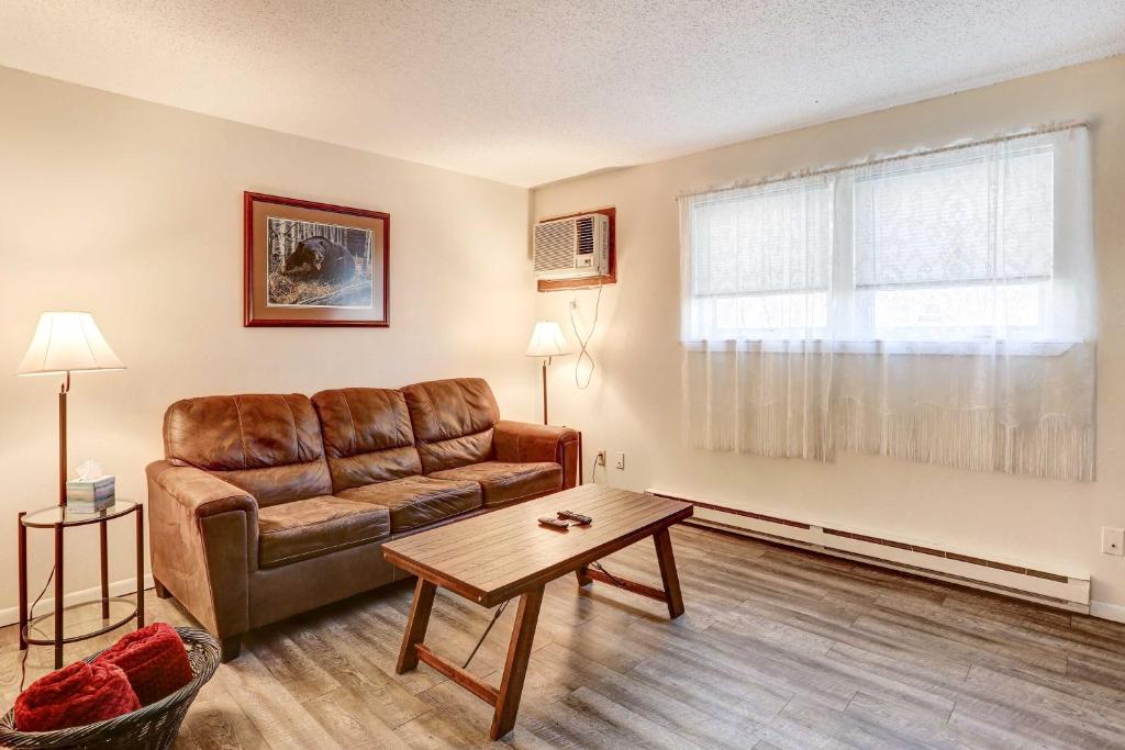 a living room with a couch and a table at Pet-Friendly Pierre Vacation Rental! in Pierre