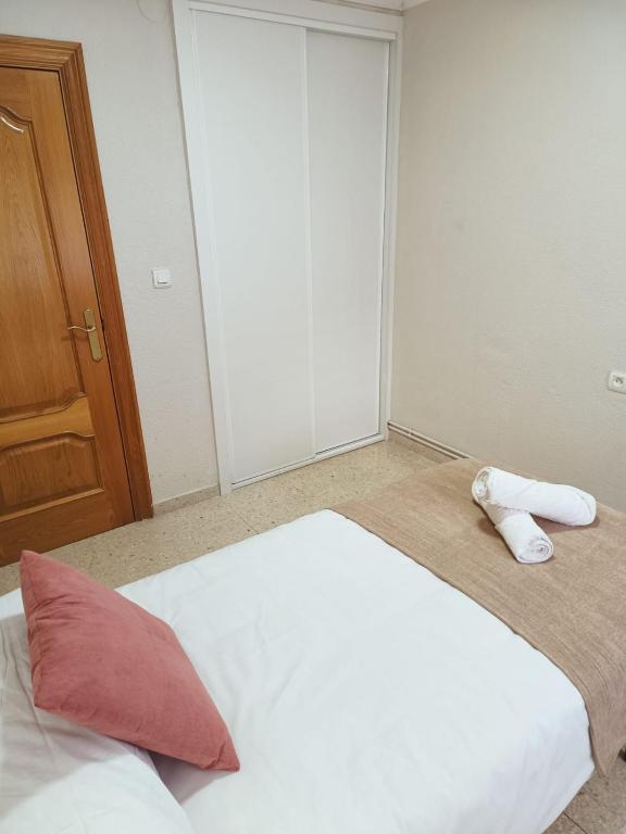 Postel nebo postele na pokoji v ubytování PISO EL SERRALLO