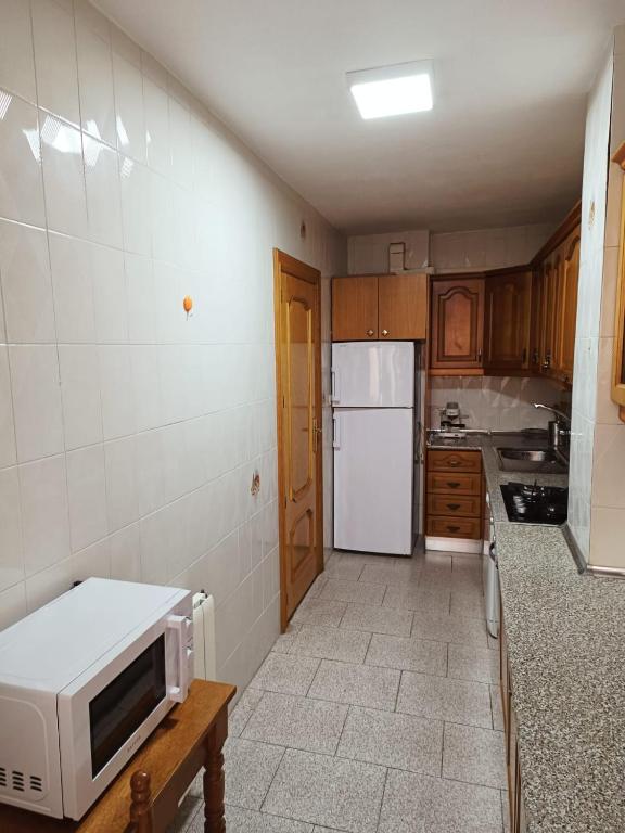 Kuchyň nebo kuchyňský kout v ubytování PISO EL SERRALLO