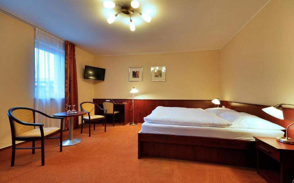 Postel nebo postele na pokoji v ubytování Penzion Siesta