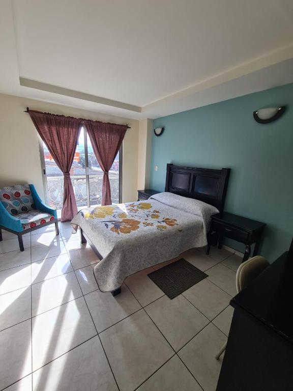 TV a/nebo společenská místnost v ubytování Hotel Santa Fe