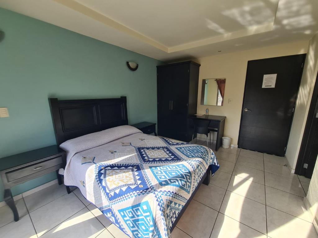Postel nebo postele na pokoji v ubytování Hotel Santa Fe