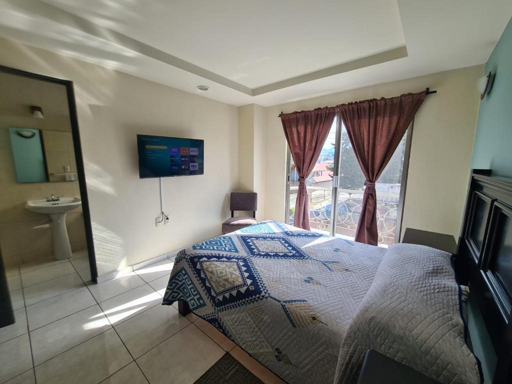 TV a/nebo společenská místnost v ubytování Hotel Santa Fe