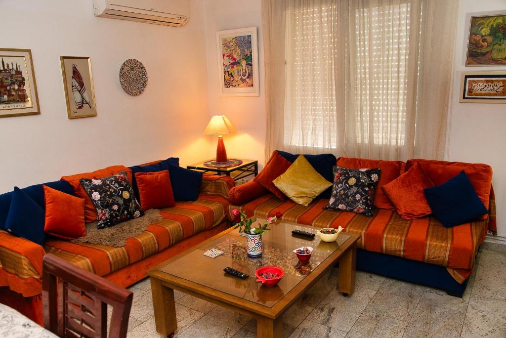 Posezení v ubytování Dar Marrakech Apartment Sousse
