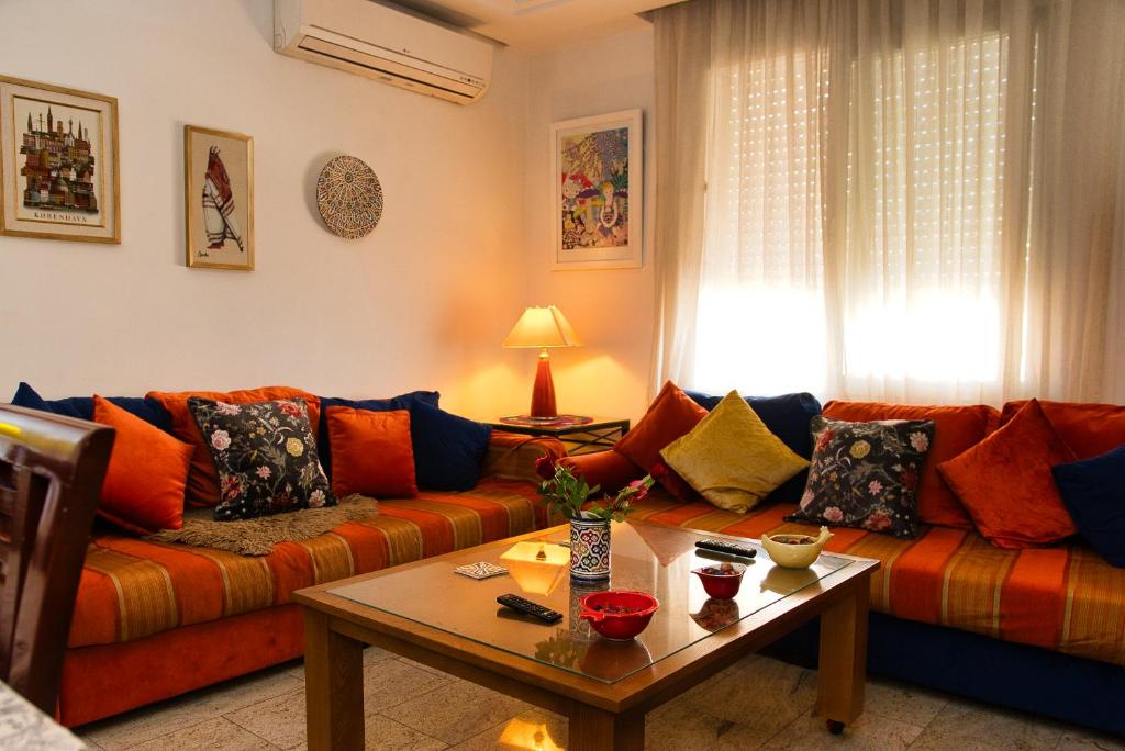Posezení v ubytování Dar Marrakech Apartment Sousse