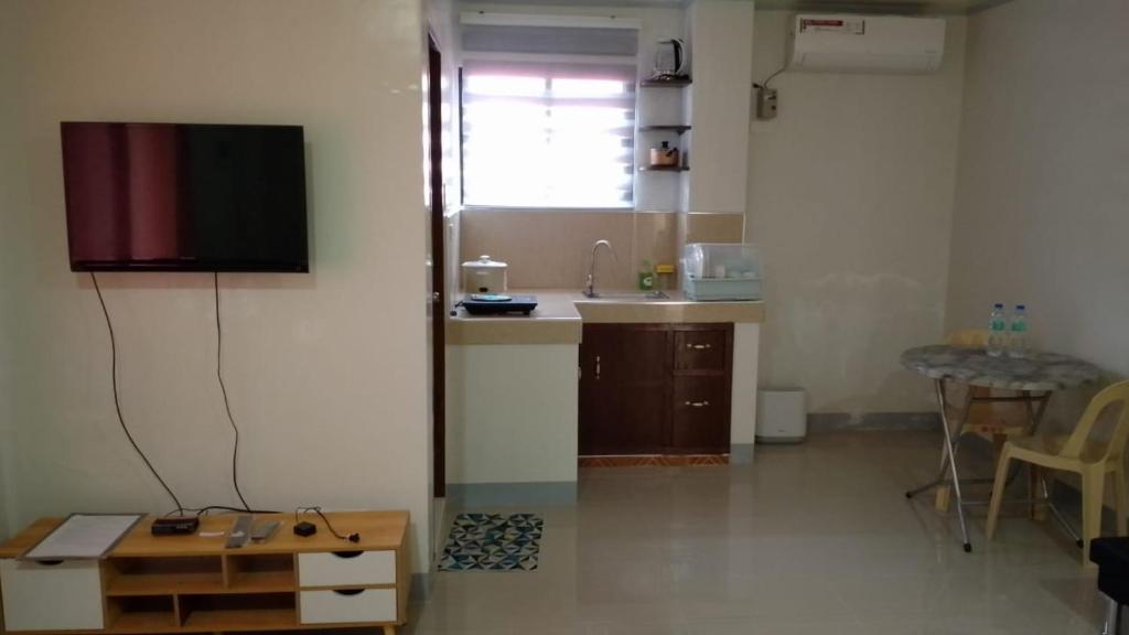 Kuchyň nebo kuchyňský kout v ubytování ZM Residence