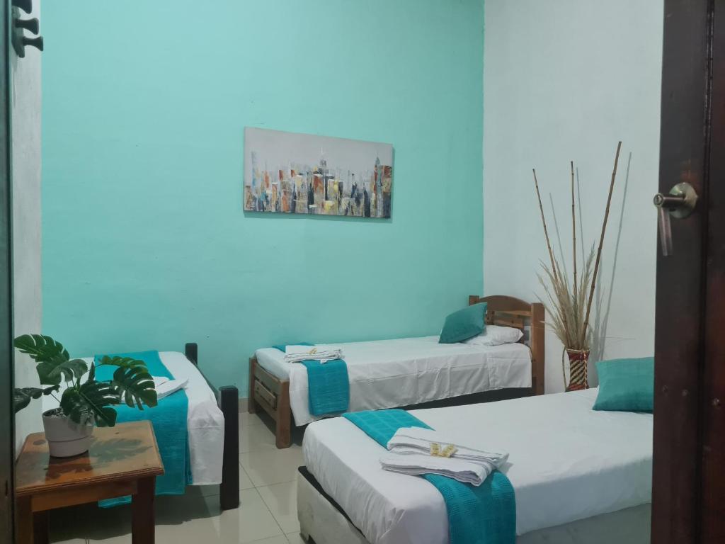 Postel nebo postele na pokoji v ubytování Hotel Alcázar Real