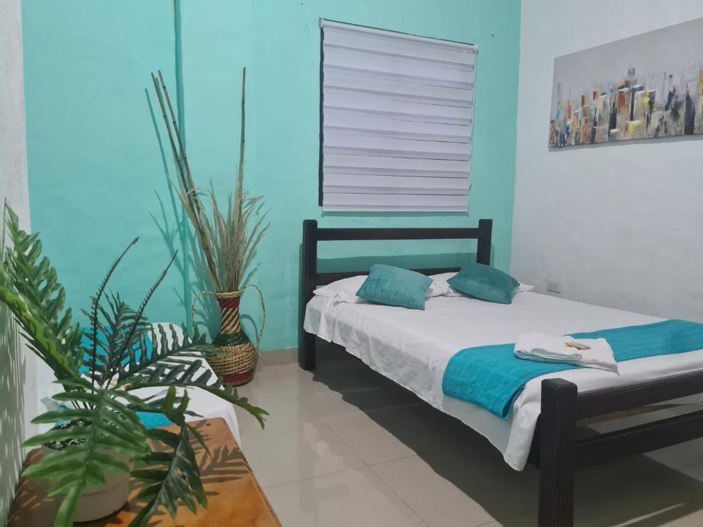Postel nebo postele na pokoji v ubytování Hotel Alcázar Real
