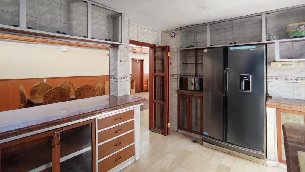 Kuchyň nebo kuchyňský kout v ubytování Hotel Livingston Inn