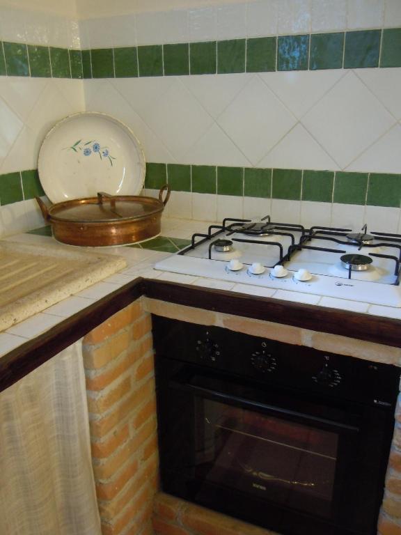 Kuchnia lub aneks kuchenny w obiekcie La Casa Sù Le Dimore Del Borgo
