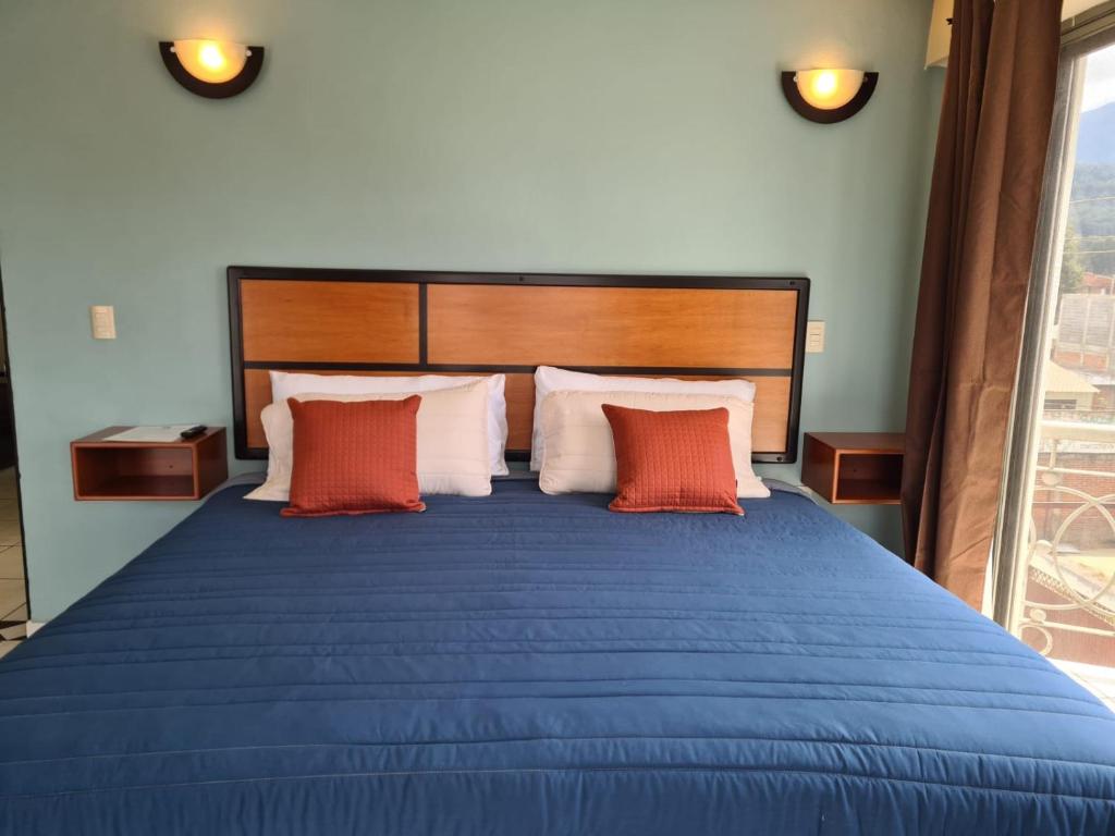 Postel nebo postele na pokoji v ubytování Hotel Santa Fe