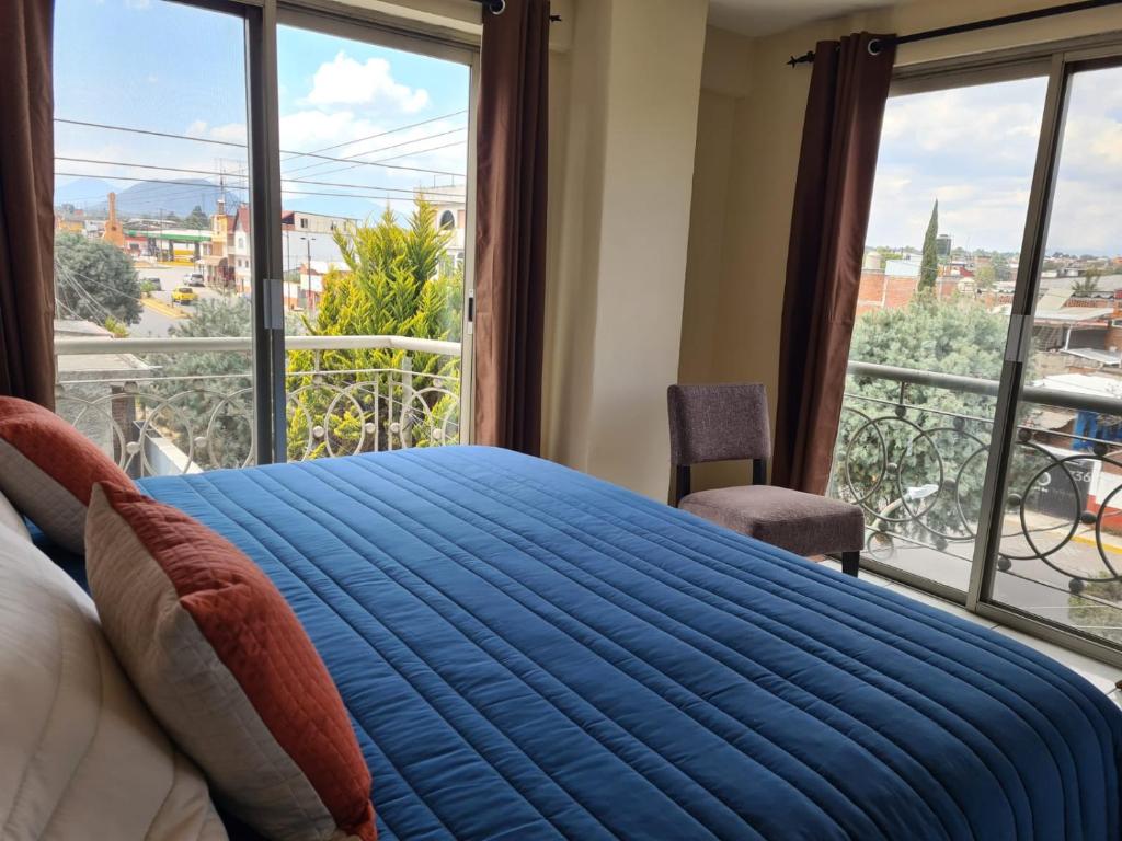 Postel nebo postele na pokoji v ubytování Hotel Santa Fe