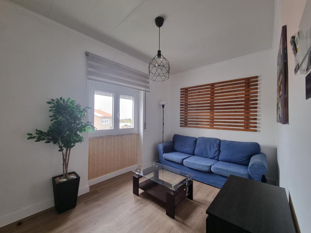 A seating area at Family Surf Home - Casa do Sol