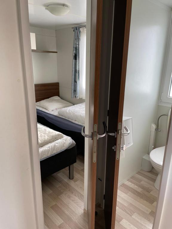 Voodi või voodid majutusasutuse Vorbasse camping toas
