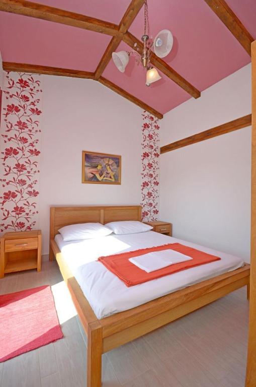 Postel nebo postele na pokoji v ubytování House Josko