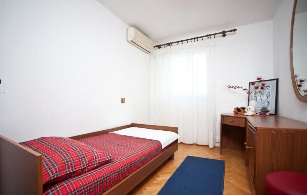 Postel nebo postele na pokoji v ubytování Villa Doris