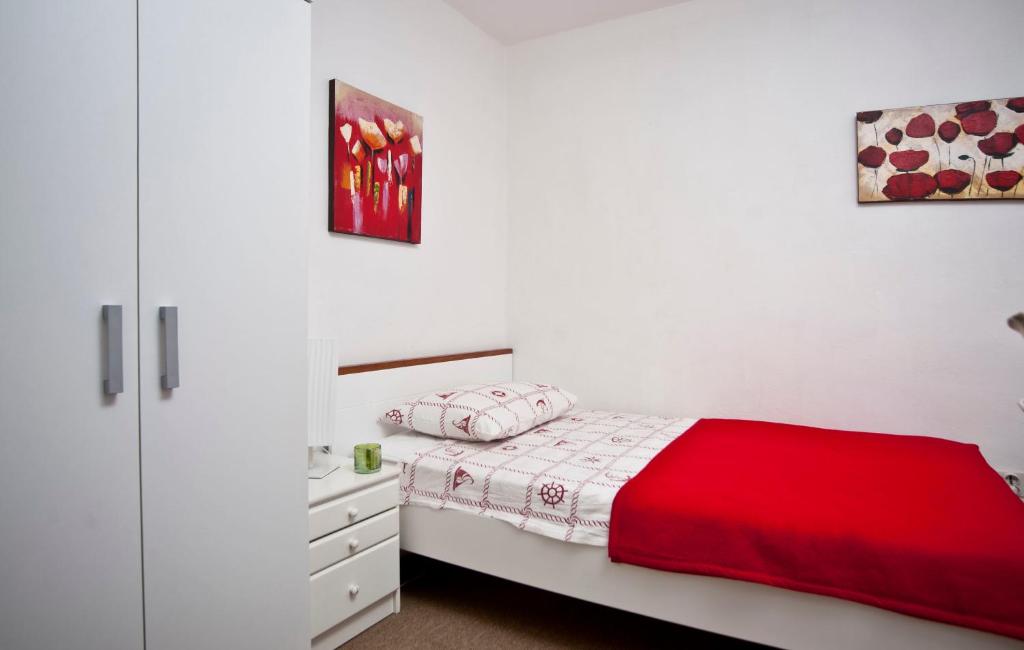 Postel nebo postele na pokoji v ubytování Villa Doris