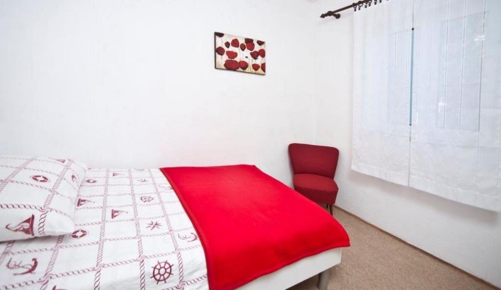 Postel nebo postele na pokoji v ubytování Villa Doris